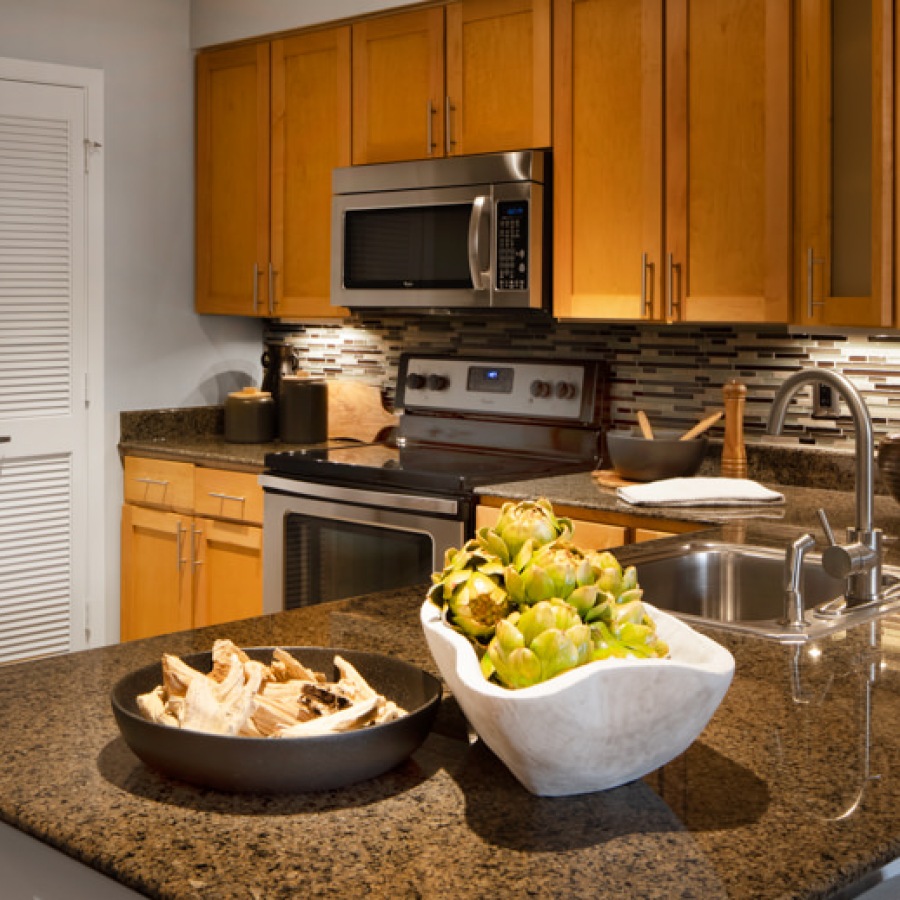 a kitchen with food on a counter